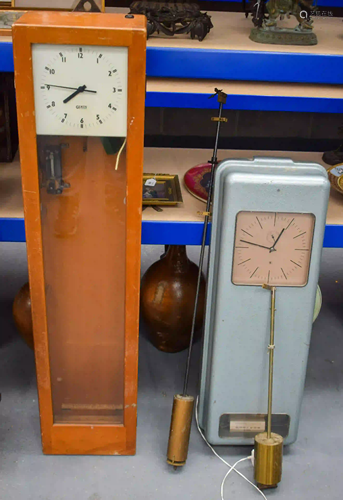 TWO LARGE VINTAGE ELECTRIC CLOCKS one wood cased,…