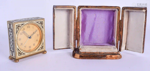 A LEATHER CASED ART DECO GILT METAL ENAMELLED