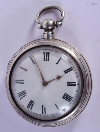 AN ANTIQUE SILVER POCKET WATCH. 5.5 cm diameter.