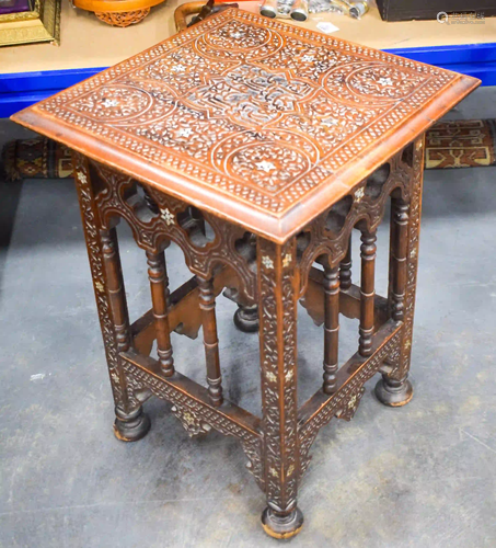 A MOORISH ISLAMIC LIBERTY TYPE HARDWOOD TABLE. 60 cm x