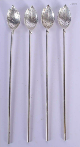 FOUR TIFFANY & CO SILVER COCKTAIL STICKS. 24 cm long.