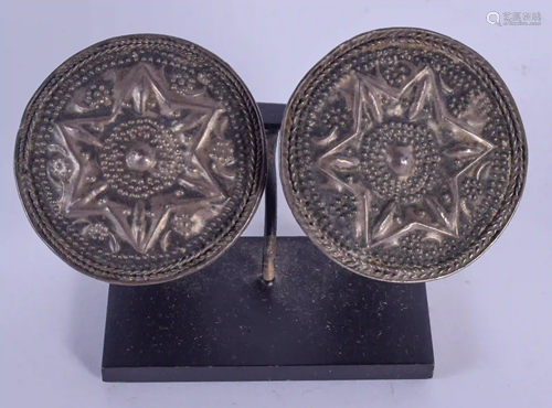 A PAIR OF EARLY MIDDLE EASTERN SILVER BUCKLES. 4.5 cm