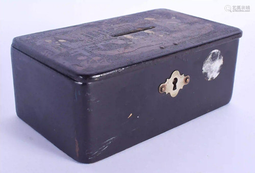 AN ANTIQUE CONTINENTAL BLACK LACQUER MONEY BOX