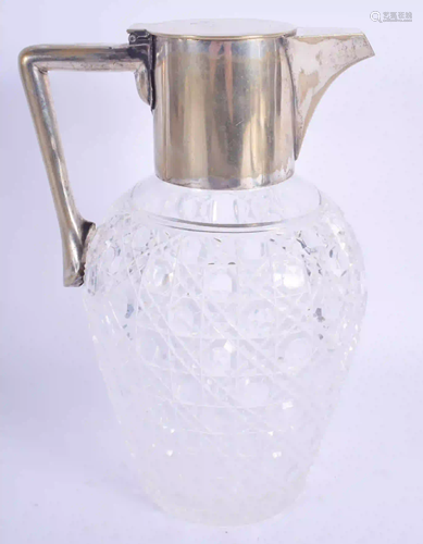 AN ART DECO SILVER PLATED DECANTER. 20 cm high.