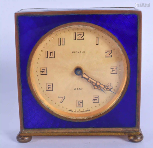 AN ART DECO GERMAN ENAMELLED EIGHT DAY DESK CLOCK…