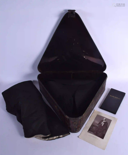 A TIN CASED ANTIQUE TRICORN HAT with cloak. Box 41 c…