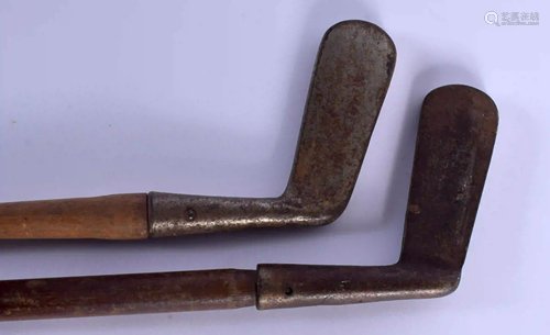 TWO VINTAGE GOLF CLUBS. 85 cm long. (2)