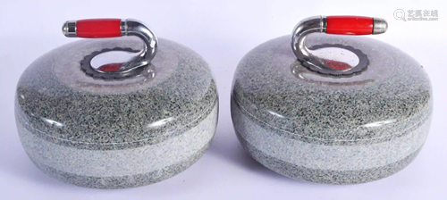 A PAIR OF BAKELITE HANDLED GRANITE CURLING STONES. 25