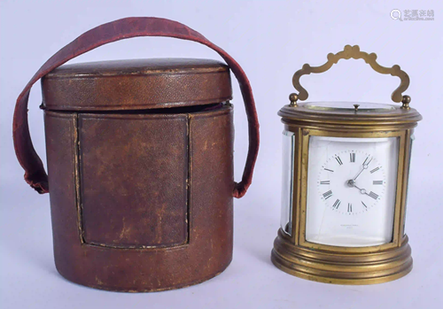 A LEATHER CASED 19TH CENTURY FRENCH BRASS OVAL