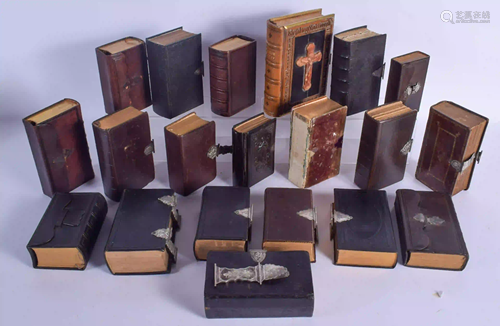 A COLLECTION OF FOURTEEN ANTIQUE SILVER MOUNTED BIBLES