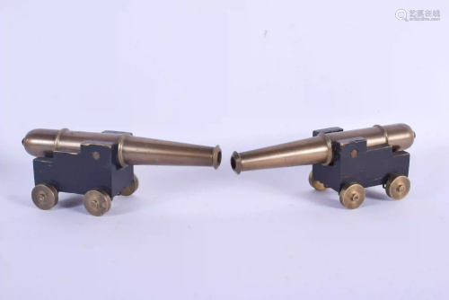 AN UNUSUAL PAIR OF ANTIQUE BRONZE CANNONS. 18 …