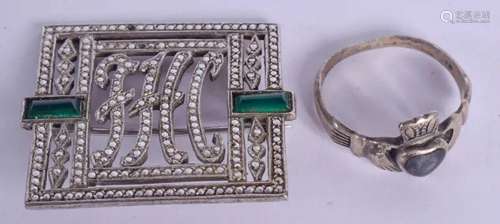 A SILVER BROOCH AND RING. (2)