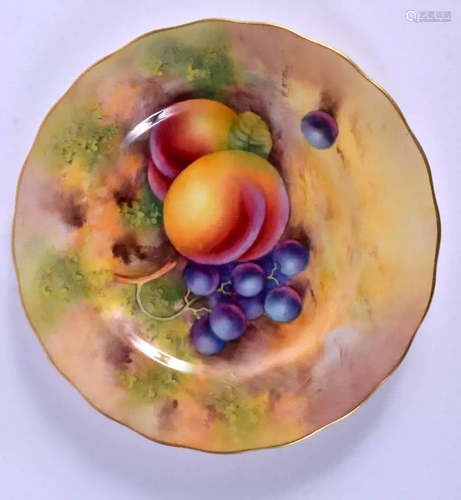 A ROYAL WORCESTER PLATE painted with fruit by H.