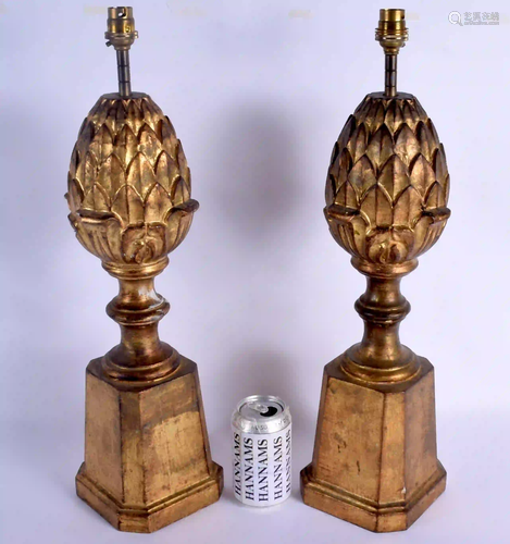 A PAIR OF ANTIQUE GILTWOOD ARTICHOKE LAMPS. Wo…