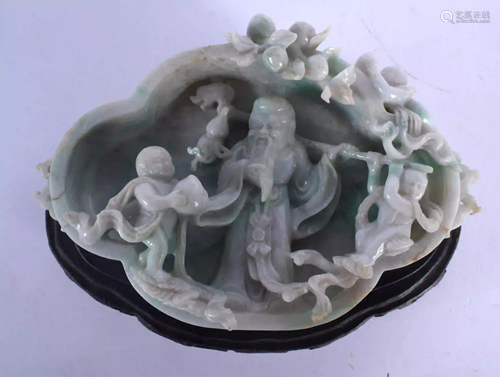 A RARE EARLY 20TH CENTURY CHINESE CARVED JADEITE BRUSH