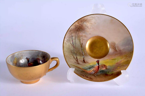 A ROYAL WORCESTER DEMI-TASSE CUP AND SAUCER painted