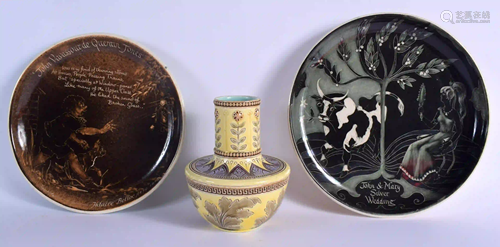 AN UNUSUAL PAIR OF ART POTTERY PLATES together with a