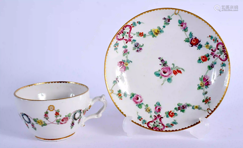 18th c. coffee cup and saucer painted with puce lyres