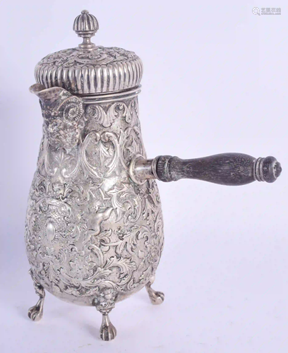 A 19TH CENTURY DUTCH SILVER EMBOSSED CHOCOLATE POT