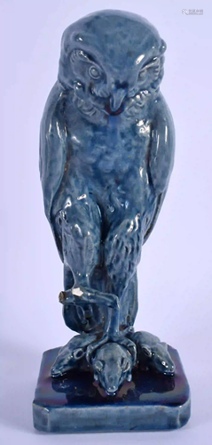 A 19TH CENTURY SCOTTISH BLUE GLAZED POTTERY OF A AN OWL