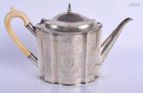 AN ANTIQUE BONE HANDLED SILVER TEAPOT AND COVER. 864