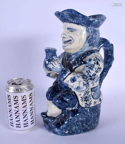 AN ANTIQUE DUTCH BLUE AND WHITE DELFT POTTERY TOBY JUG