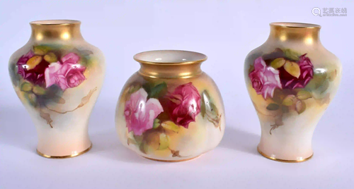 A ROYAL WORCESTER PAIR OF VASES painted with Hadley