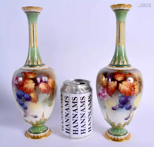 A ROYAL WORCESTER PAIR OF VASES painted with autumnal