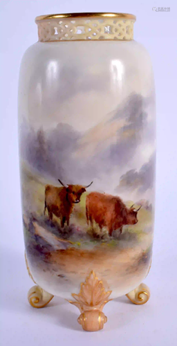 A ROYAL WORCESTER VASE with pierced neck supported on