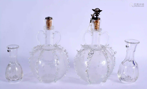 A PAIR OF 19TH CENTURY GLASS DECANTERS together with a