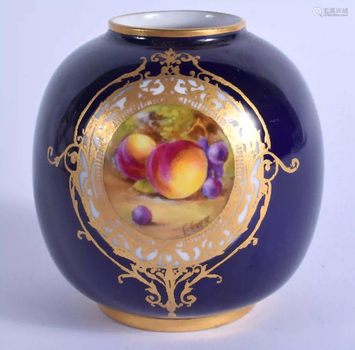 A ROYAL WORCESTER VASE painted with painted with fruit