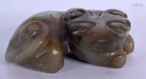 A 19TH CENTURY CHINESE CARVED MUTTON JADE FIGURE OF A