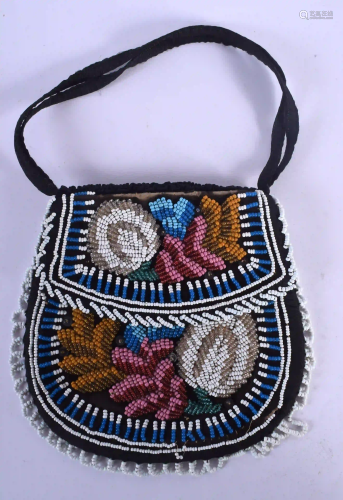 A VINTAGE AMERICAN INDIAN BEADWORK PURSE possibly