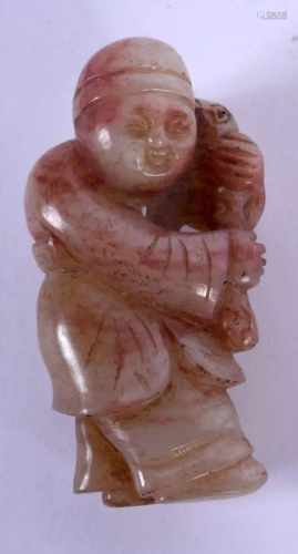 A 19TH CENTURY CHINESE CARVED JADE FIGURE OF A BOY