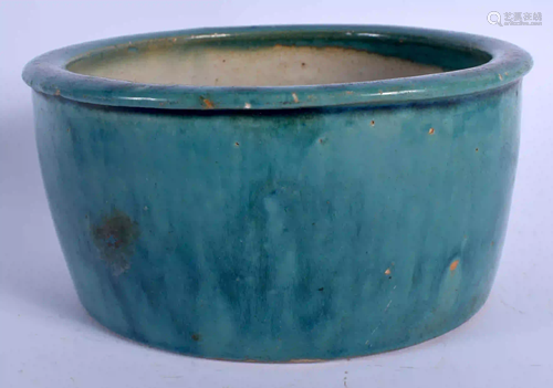 A 19TH CENTURY CHINESE GREEN GLAZED STONEWARE CENSER