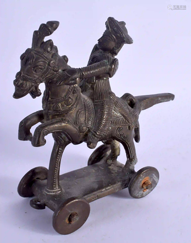 AN 18TH/19TH CENTURY MIDDLE EASTERN INDIAN BRONZE