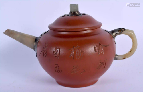 A CHINESE YIXING POTTERY JADE HANDLED TEAPOT AND COVER