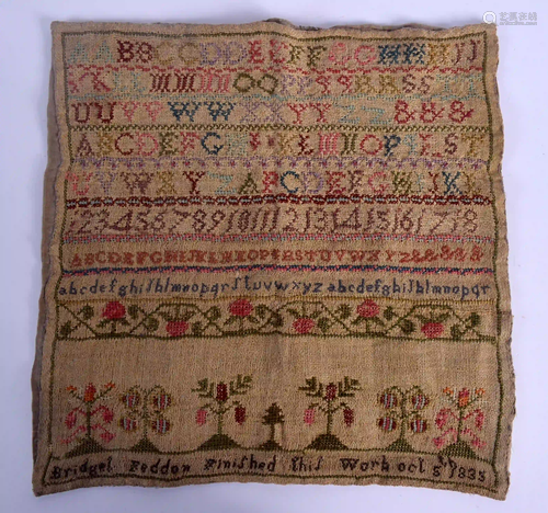 AN EARLY 19TH CENTURY ENGLISH EMBROIDERED SAMPLER. 28