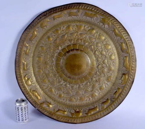 A LARGE 19TH CENTURY INDIAN SRI LANKAN BRASS DISH