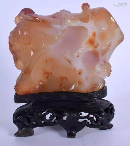 A 19TH CENTURY CHINESE CARVED AGATE BOULDER Late Qing,