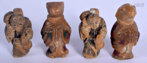 FOUR JAPANESE CARVED NUT NETSUKES. (4)
