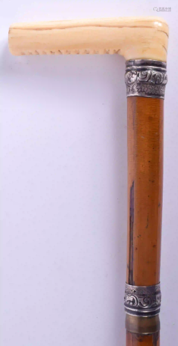 A VICTORIAN SILVER MOUNTED BONE SWORD STICK. 82…