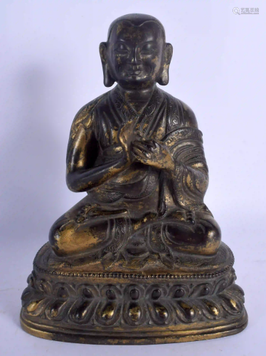 A CHINESE TIBETAN QING DYNASTY BRONZE FIGURE OF A
