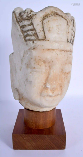 A LARGE CHINESE CARVED MARBLE BUST OF A BUDDHISTIC