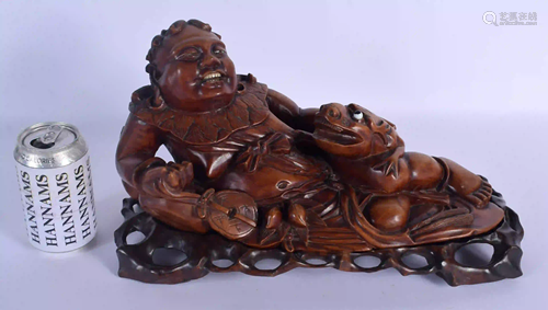 A LARGE 19TH CENTURY CHINESE CARVED HARDWOOD FIG…