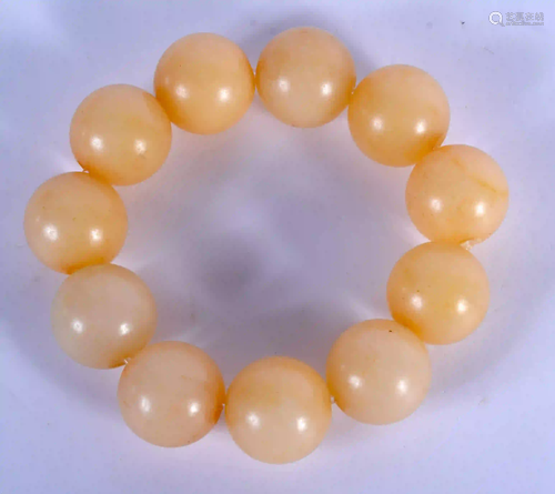 A CHINESE CARVED GREYISH WHITE JADE BEAD BRACELET 20th