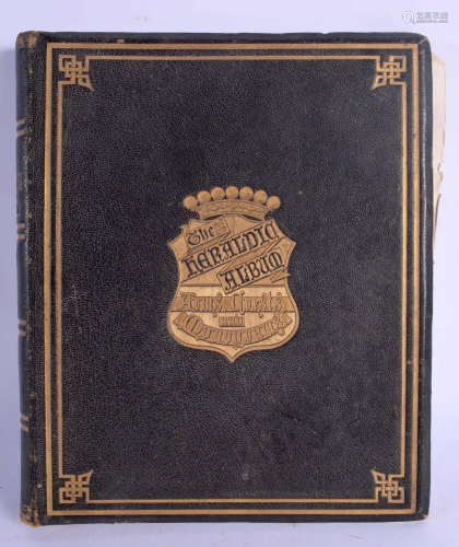 A HERALDIC MOROCCAN LEATHER BOUND ALBUM.