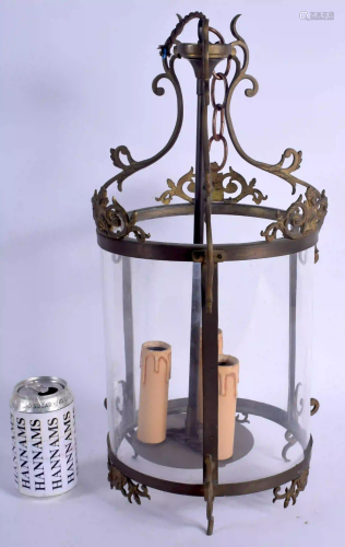 A EUROPEAN GILT METAL GLASS LANTERN. 45 cm x 20 cm.