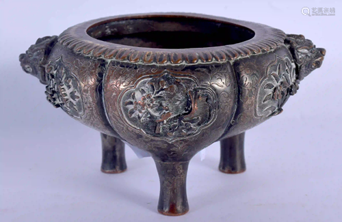 A 19TH CENTURY CHINESE TWIN HANDLED BRONZE CENSER