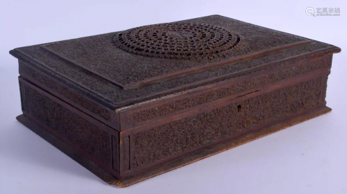 A LATE 19TH CENTURY MIDDLE EASTERN CARVED HARDWOOD